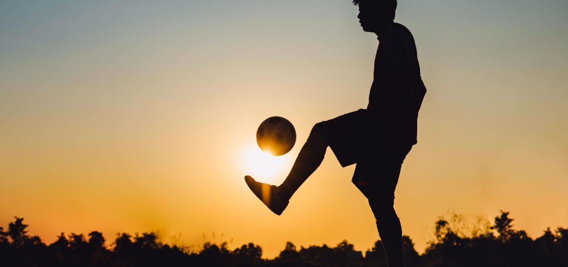 Silhouette soccer football player