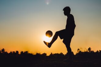 Silhouette soccer football player